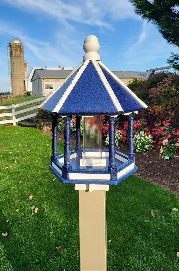 A handcrafted blue and white bird house bird feeder with a premium feeding tube, made from durable poly lumber for long-lasting outdoor use.